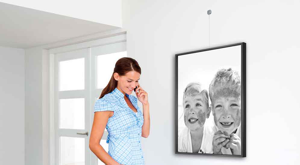 Just a little different on the wall. Hang a frame without a rail.